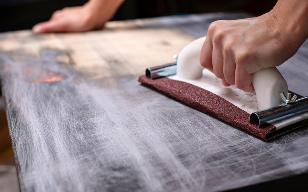 What is the fastest way to remove paint from wood?